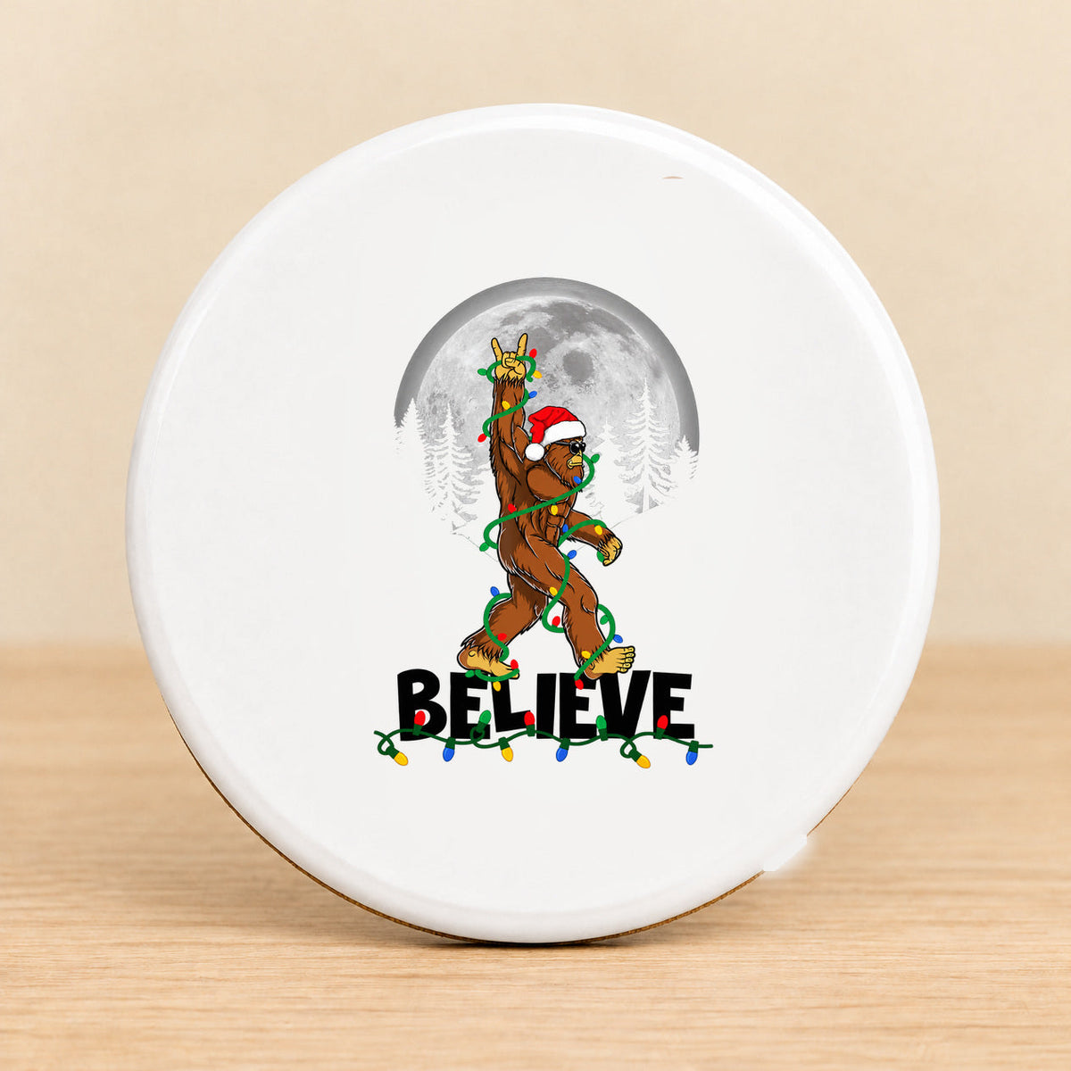 Believe Bigfoot Moon — Round Ceramic Coaster — black BELIEVE lettering