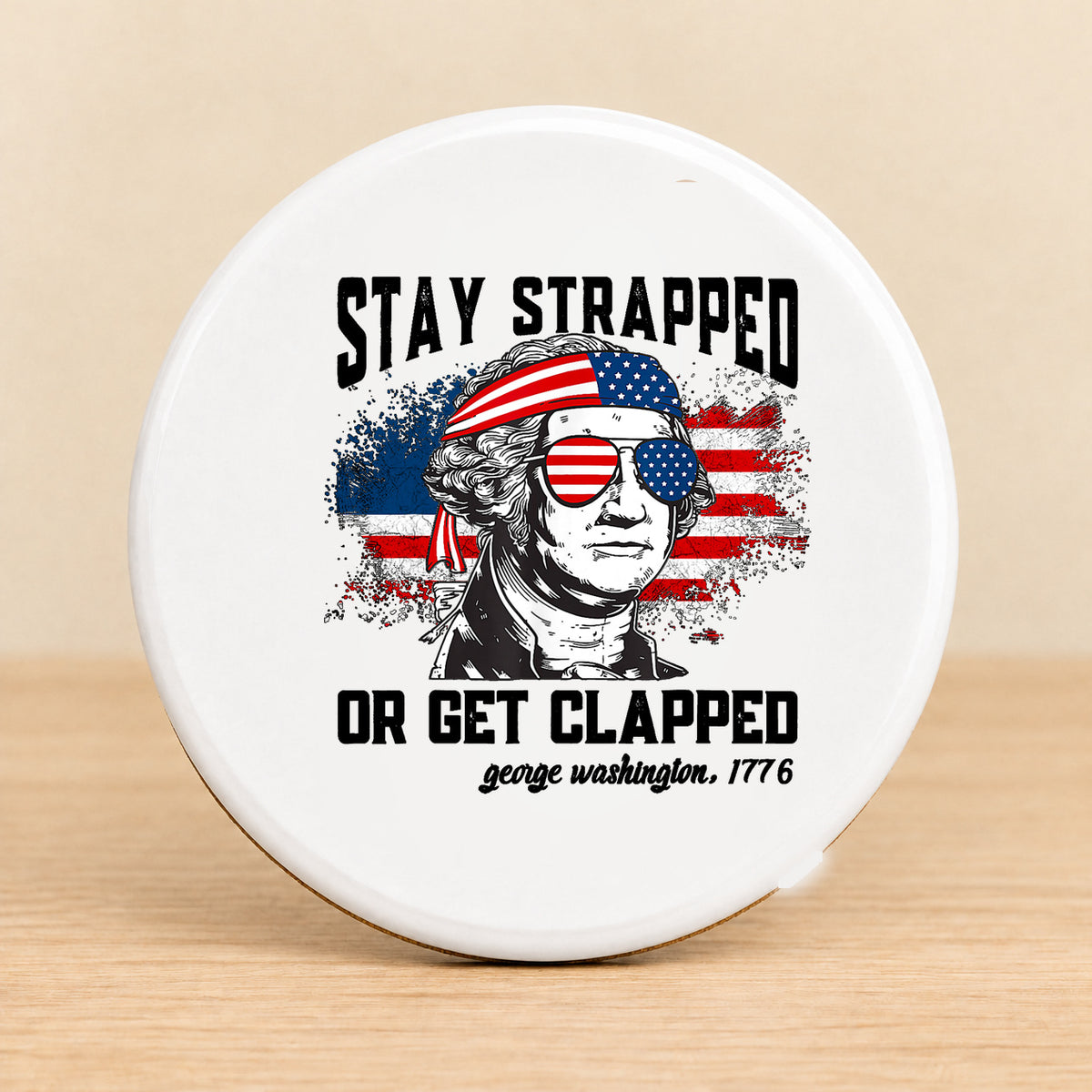 Stay Strapped or Get Clapped — Round Ceramic Coaster