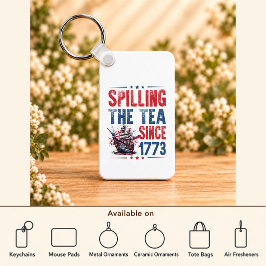 Spilling the Tea Since 1773 — Rectangle Keychain featured; available on keychains, mouse pads, metal ornaments, ceramic ornaments, tote bags and air fresheners