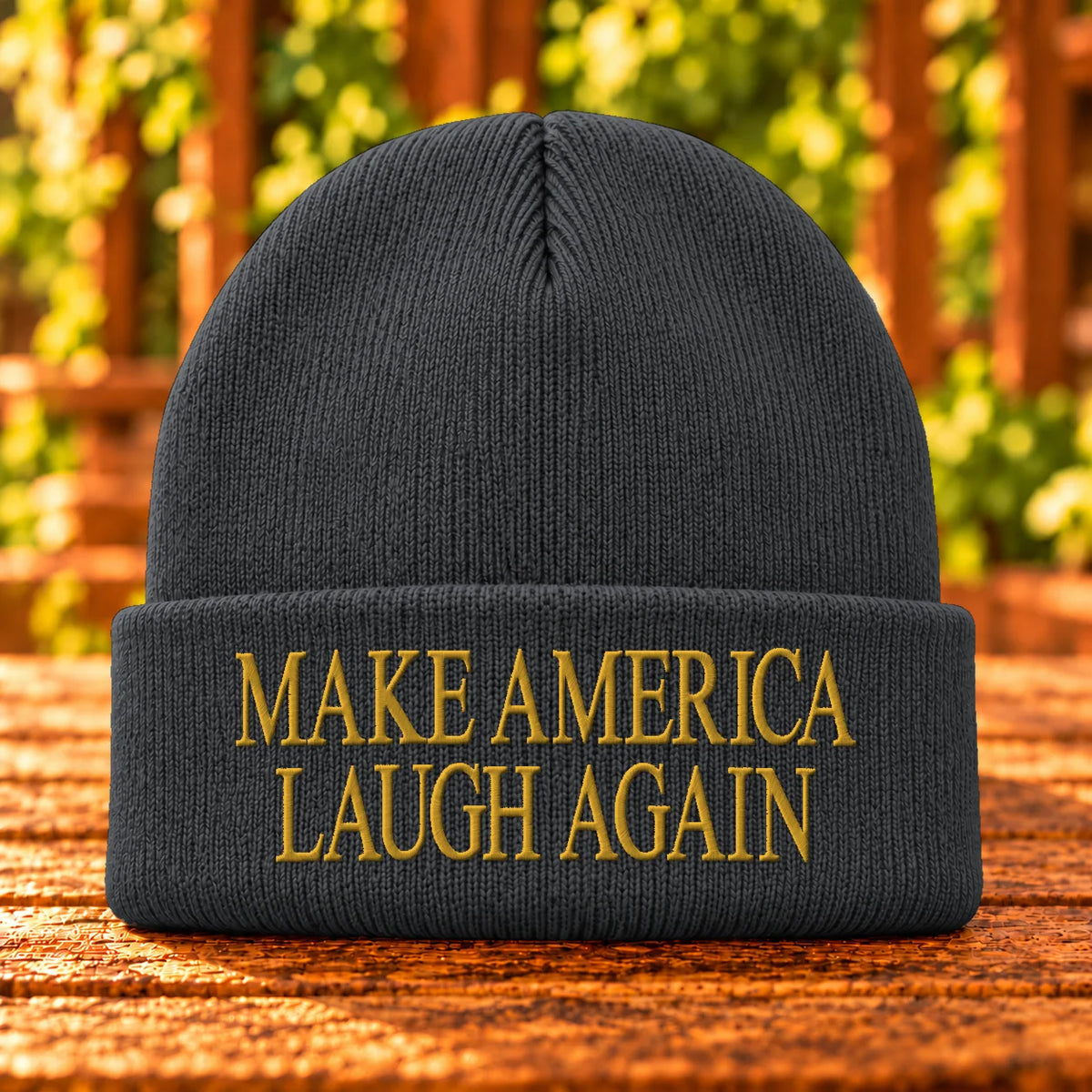Make America Laugh Again — Charcoal Heather beanie with Gold embroidery