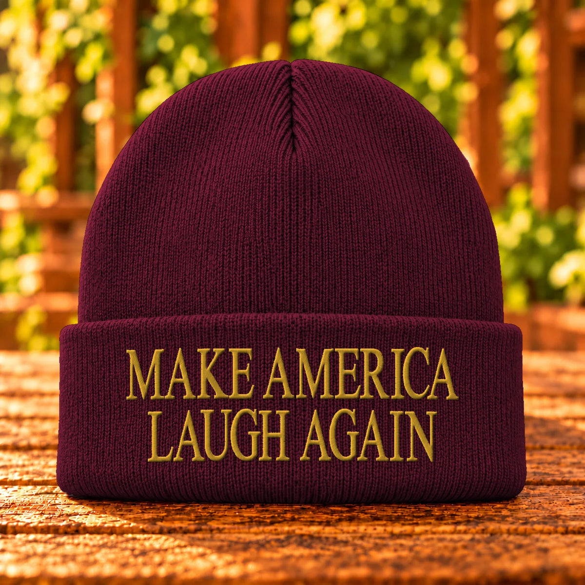 Make America Laugh Again — Maroon beanie with Gold embroidery