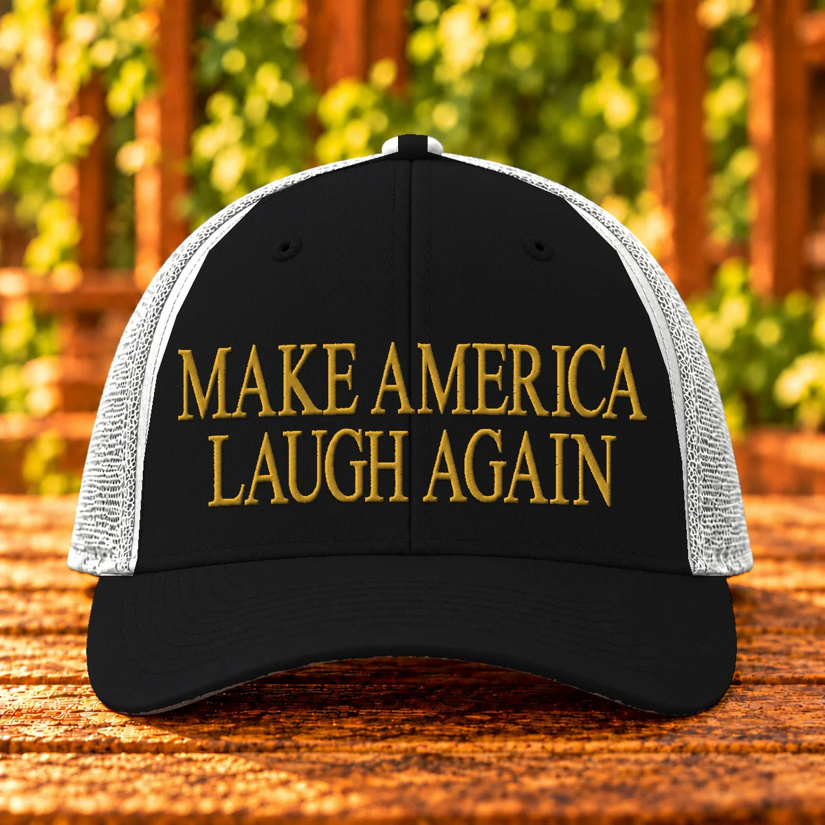 Make America Laugh Again — Black/White trucker with Gold embroidery