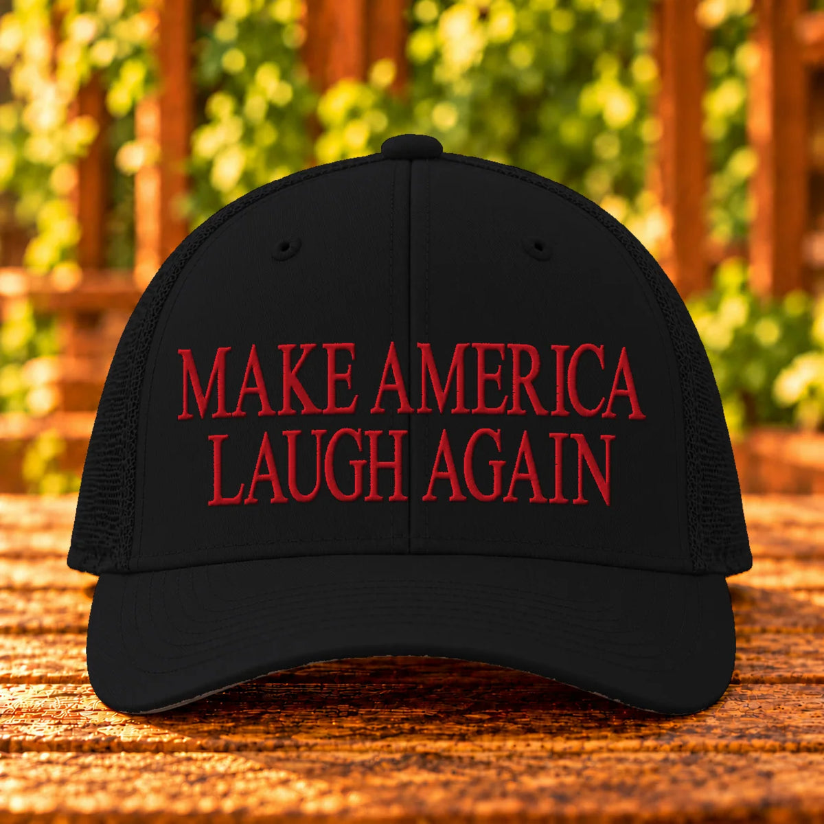 Make America Laugh Again — Black trucker with Red embroidery