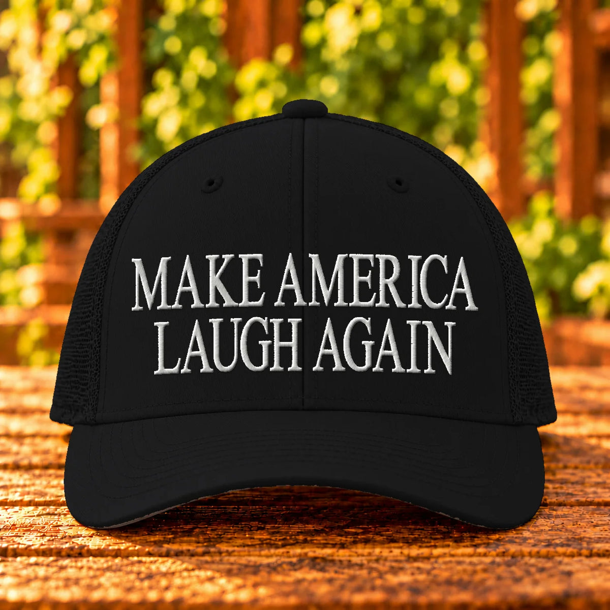 Make America Laugh Again — Black trucker with White embroidery