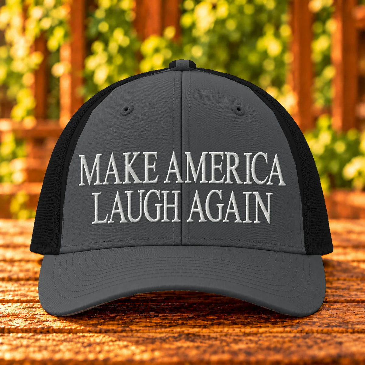Make America Laugh Again — Charcoal/Black trucker with White embroidery