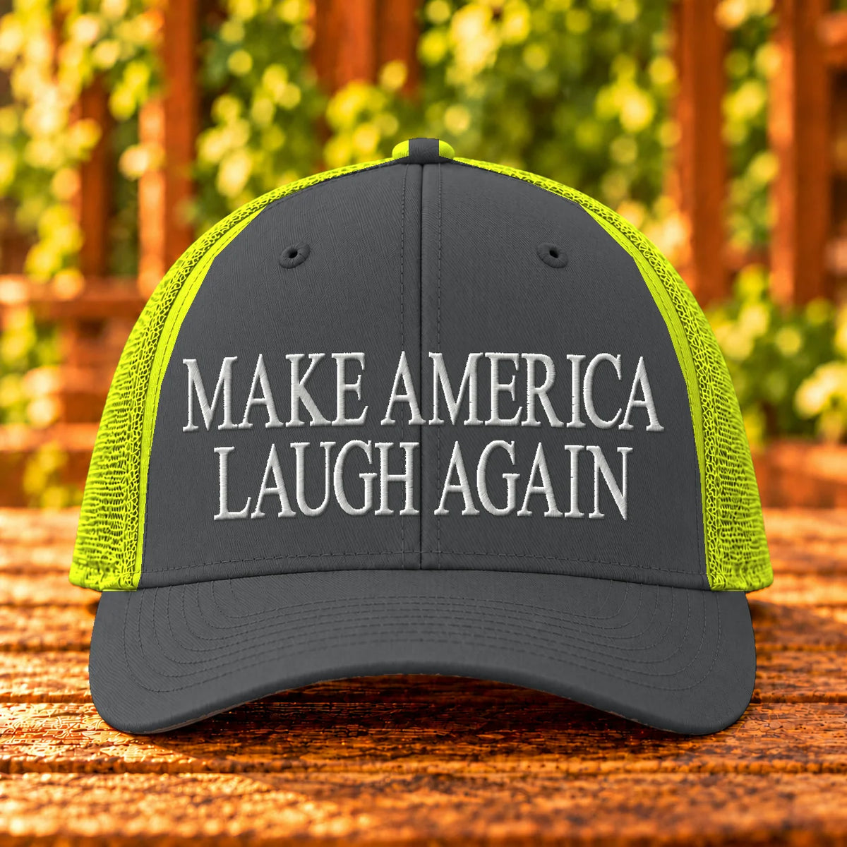 Make America Laugh Again — Charcoal/Neon Yellow trucker with White embroidery