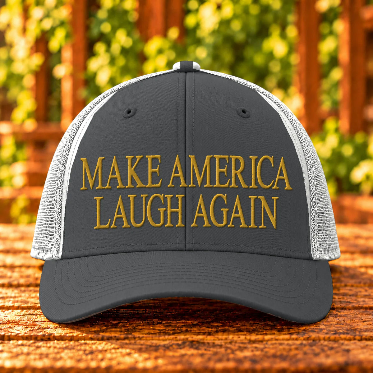 Make America Laugh Again — Charcoal/White trucker with Gold embroidery