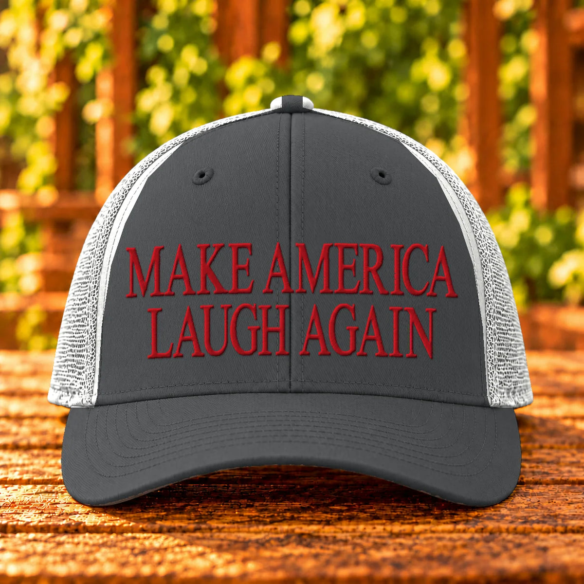 Make America Laugh Again — Charcoal/White trucker with Red embroidery
