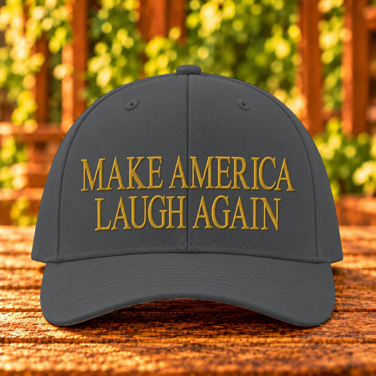 Make America Laugh Again — Charcoal twill with Gold embroidery