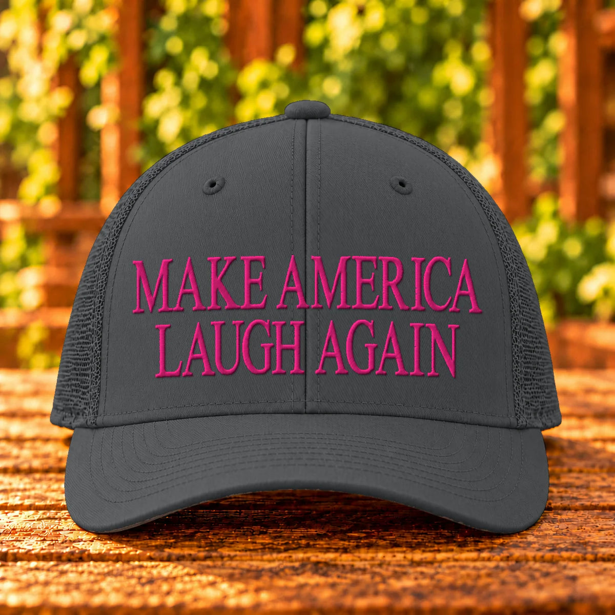 Make America Laugh Again embroidered Charcoal trucker, Hot Pink thread