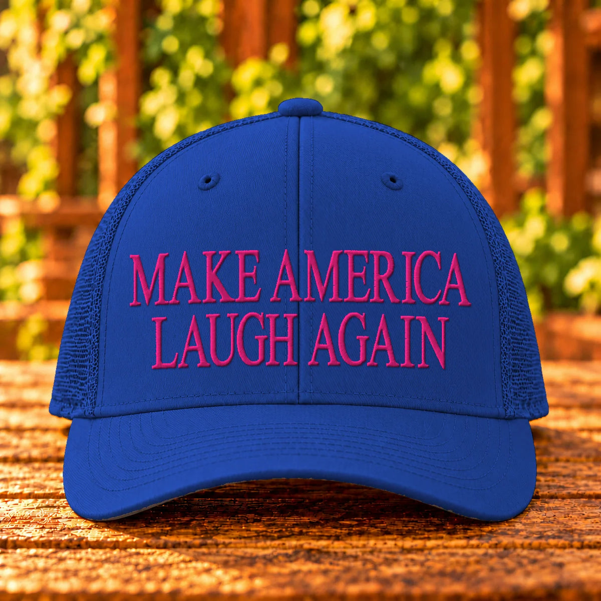 Make America Laugh Again embroidered Royal trucker, Hot Pink thread