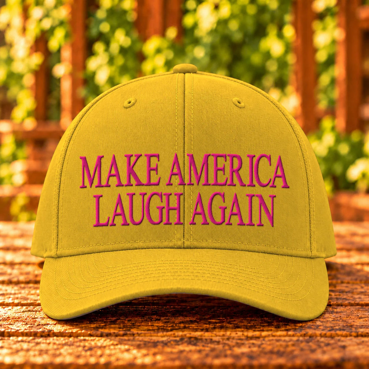 Make America Laugh Again embroidered Gold twill, Hot Pink thread