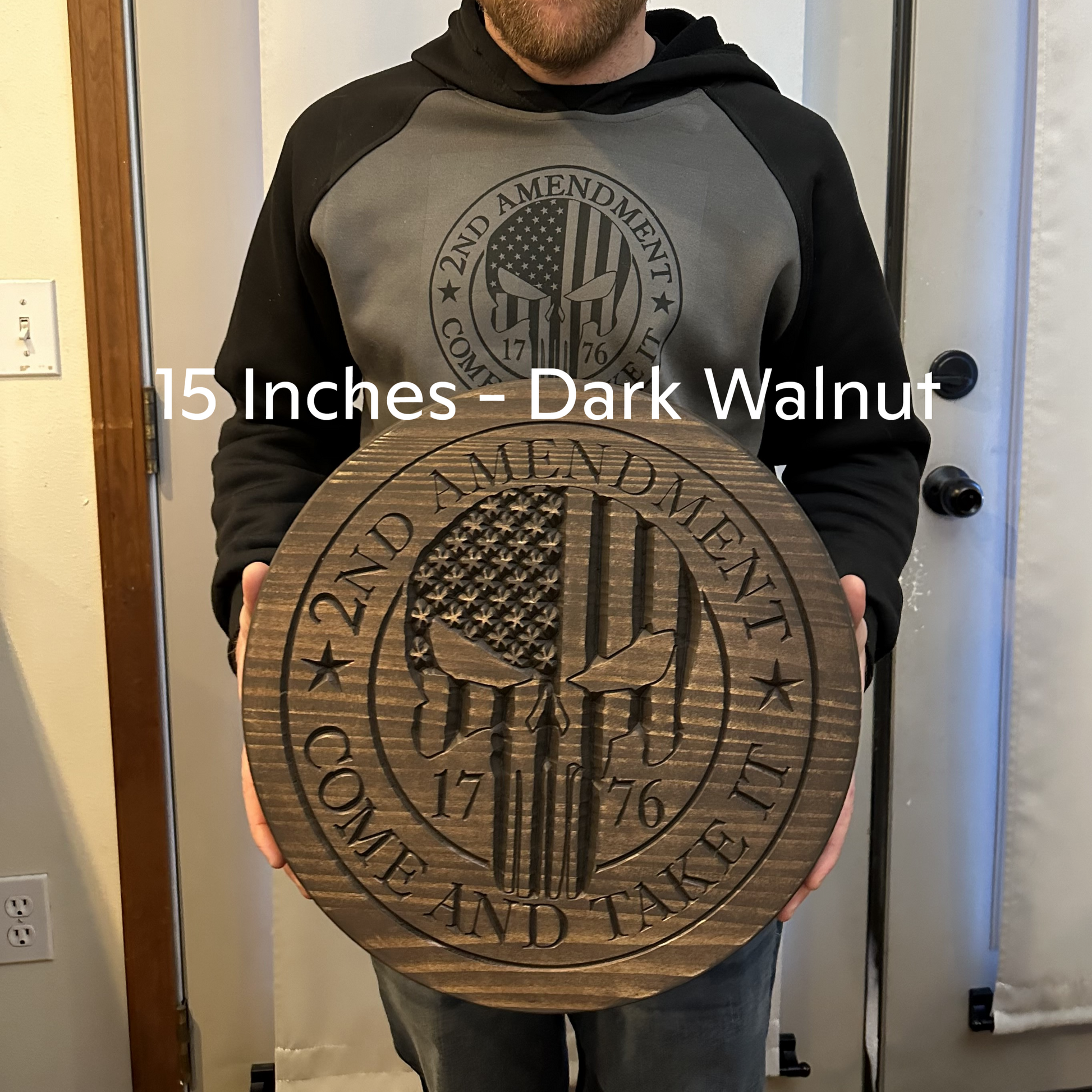 a man is holding a plaque in front of his face