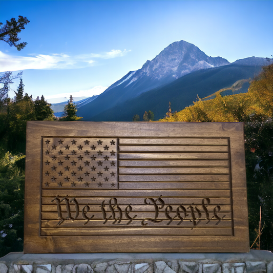 a wooden plaque with the american flag on it