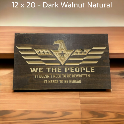 we the people sign on a wooden shelf